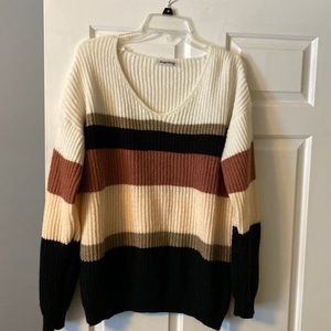 Oversized medium sweater. Black/brown/cream